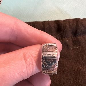 Size 7 sterling silver coach ring.